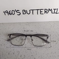Detalle de las gafas de media montura gris semitransparente con almohadillas nasales - Color Gunmetal
