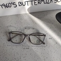 Detailed specs of gray cat-eye glasses showing 13g weight and 13.8cm frame width - Transparent Gray