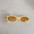 Retro cream white oval kids sunglasses with brown lenses and Y2K aesthetic style - Yellow