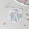 Star-shaped acrylic photo card holder with blue wings and a white bead chain hanging - Blue Wing Star