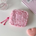 Detailed view of pink leopard plush makeup bag with zipper and woven Hisocute label - Pink