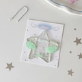 Glittering star-shaped acrylic card holder with light green wings and bead chain - Green Wing Star