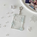 Detalle del portafotos de acrílico con copos de nieve azul y llavero estrella de metal - Copo de nieve azul