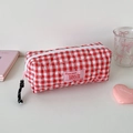 Close-up of red and white quilted checkered pencil case with zipper and fabric label - Rose Red