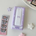 Detail view of purple Angel Fantasy photocard binder with transparent window and star charm - Purple