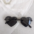 Black heart-shaped kids sunglasses with 3D floral accents and white polka dots - Flower Chain Black Grey