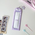 Macro shot of purple plush wing card holder with angel text and star charm accessory - Purple
