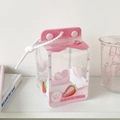 Detailed shot of strawberry milk carton doll bag with clear PVC and beaded handle - Pink Strawberry Style