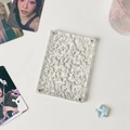 Macro detail of acrylic display card holder with water ripple texture and magnetic buckle - Single Slot Card Brick