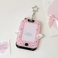 Macro detail of pink glittery acrylic photo holder with cat gaming design and wing accents - Pink