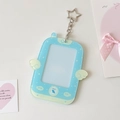 Detail of light blue acrylic photo card holder with wings and star-shaped clip - Blue