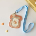 Close-up of cute bread-shaped PU leather card holder with blue polka dot lanyard - Cute Dog