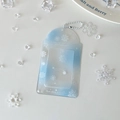 Detail of blue gradient PVC card holder with white snowflake patterns and bead chain - Transparent Ink Blue Snowflake