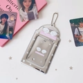 Detail of silver mirror photocard holder with angel wings and metal ball chain - White Angel Wings