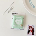 Detail of light green 2-inch mini photo album with angel wings and heart window - Green