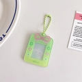 Detail of light green acrylic photo card holder with pink bow and bead chain - Green