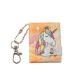 Dettaglio di un mini taccuino unicorno glitterato con corona dorata e fibbia argento - Unicorno arancio