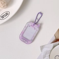 Detail view of purple acrylic phone-shaped photo card holder with cute cat pattern - Purple