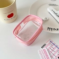 Detailed view of pink PVC transparent coin purse with clip and desk accessories - Pink