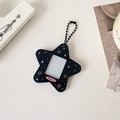 Detail of star-shaped black acrylic photo holder with pink stars and a metal bead chain - Black Glitter