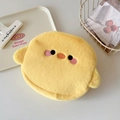 Detail of cute yellow plush chick storage bag with fine embroidery and small 3D wings - Yellow