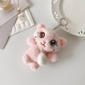 Detail of pink plush cat keychain with embroidered face and silver metal ring accessory - Pink