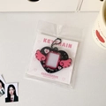 Detail of black glitter acrylic heart photocard holder with pink wings and ball chain - Black