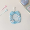 Close-up of a blue ribbon photo card holder with cute cartoon dog and lace patterns - Blue (Dog Style)