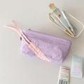 Detail of purple nylon pencil case with pink drawstring and metallic zipper closure - Purple