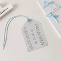 Detailaufnahme von hellblauer PVC-Kartenhülle mit Blumenmuster und Kordelzug - Blau - Winning Prayer