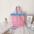 Pink mesh storage bag with purple handles and blue zipper for toiletries and cosmetics - Pink