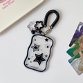 Close-up of wavy clear star card holder with black spring lanyard and cute charms - Black