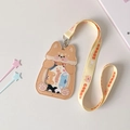 Dettaglio del porta carte Corgi con cordino stampato abbinato e cuciture fini - Cane Cachi