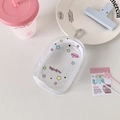 Detailed macro view of clear PVC storage bag with colorful star prints and metal carabiner - Colorful Star