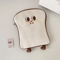 Close-up of toast-shaped plush tablet sleeve showing embroidery and zipper detail - Large - Brown