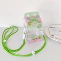 Detail der süßen Milchtüten-Tasche mit Kleeblatt-Print und grünem Schultergurt - Grünes Kleeblatt