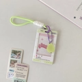 Detail of light green PVC card holder with braided lanyard and cute pear charm - Green Pear Charm Style / Green