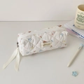 Quilted floral bunny makeup bag with white ribbon pull and socute label on desk - White