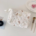 Cute bear quilted makeup bag with large capacity for travel and cosmetics storage - White