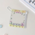 Detailed view of PVC cartoon storage bag with cute ribbon prints and bead chain hanger - Yellow