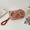 Detail of plush heart pattern pencil case with Hisocute brand tag and soft texture - Brown
