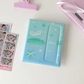 Mint green 4-grid photo album cover with white wings and star patterns for k-pop cards - Blue Green Gradient