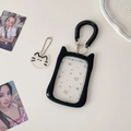 Detail of cute black cat ear card holder with retractable spiral wrist strap and charm - Black Cat