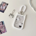 Detail of white cat-ear silicone card holder with spring lanyard and acrylic charm - White Two Cats
