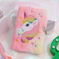 Detail of plush unicorn A5 diary with metal lock on a colorful aesthetic background - Tie-dye Multicolor