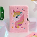 Close-up of pink plush unicorn notebook featuring a metal lock and colorful embroidery - Pink