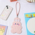 Close-up of pink plush bunny card holder with soft embroidery and wrist strap - Pink Rabbit