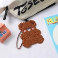 Detailed close-up of brown plush bear card holder with soft texture and leather strap - Brown Bear