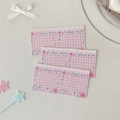 Detailed view of pink grid decorative cards with cute rabbit and star motifs - Pink Plaid
