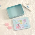 Close-up of light blue tin storage box featuring romantic butterfly illustrations - Butterfly Love Style / Green